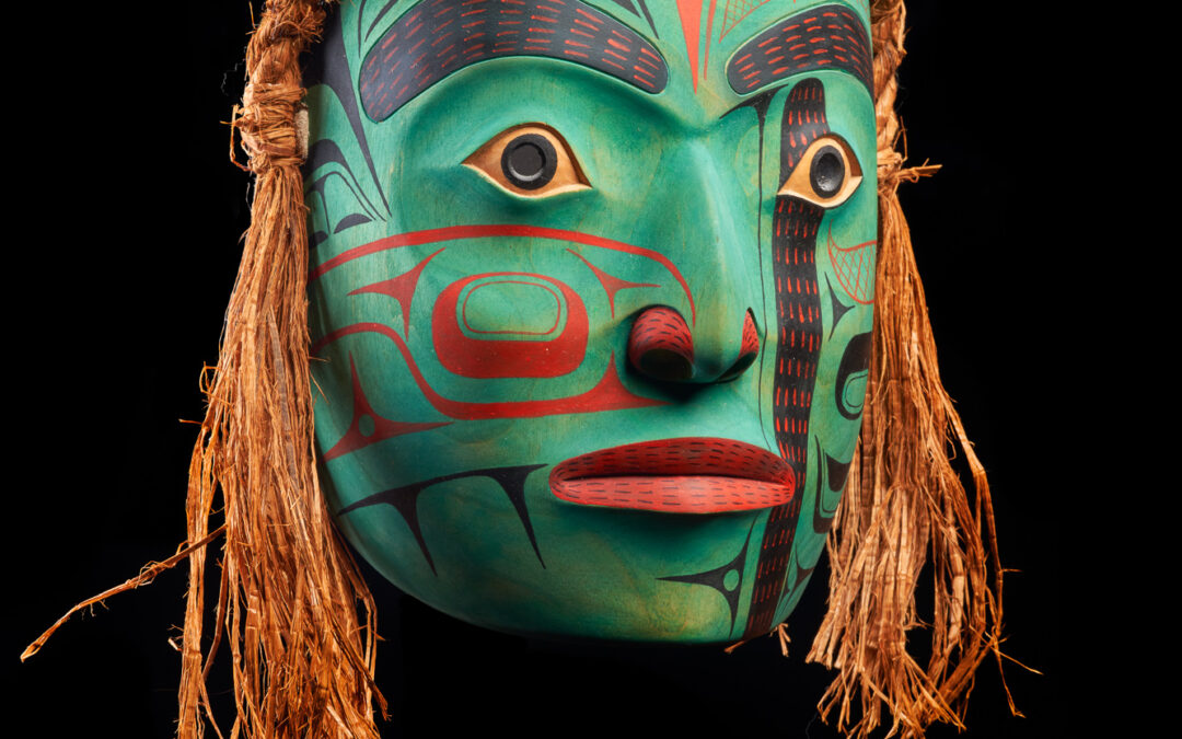 Native American mask with green skin and straw hair