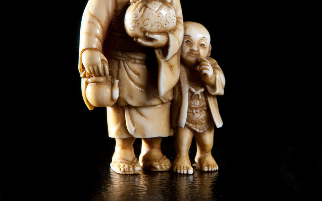 Japanese ivory artwork showing mother and child