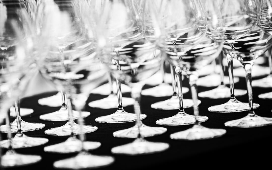 wine glasses arranged on table
