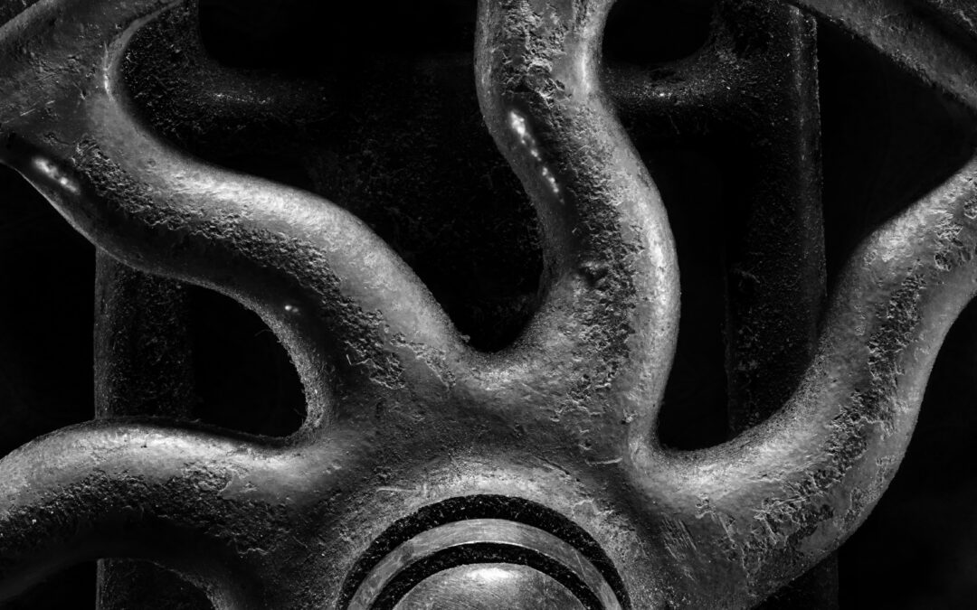black and white macro close up of central mechanism in hand drill