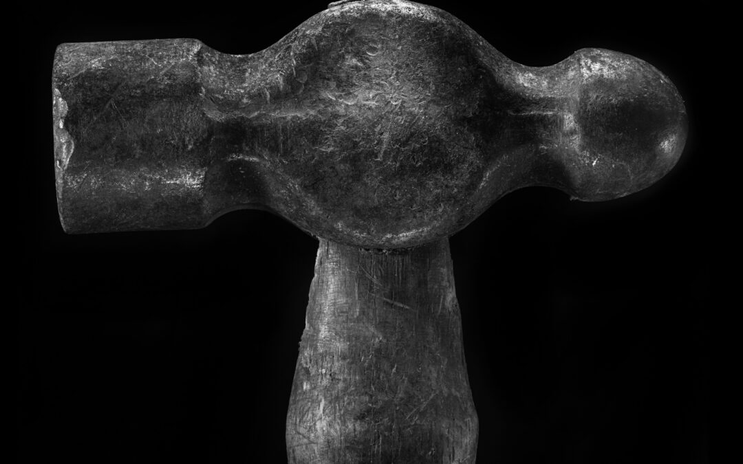 dramatic black and white photo of vintage hammer head