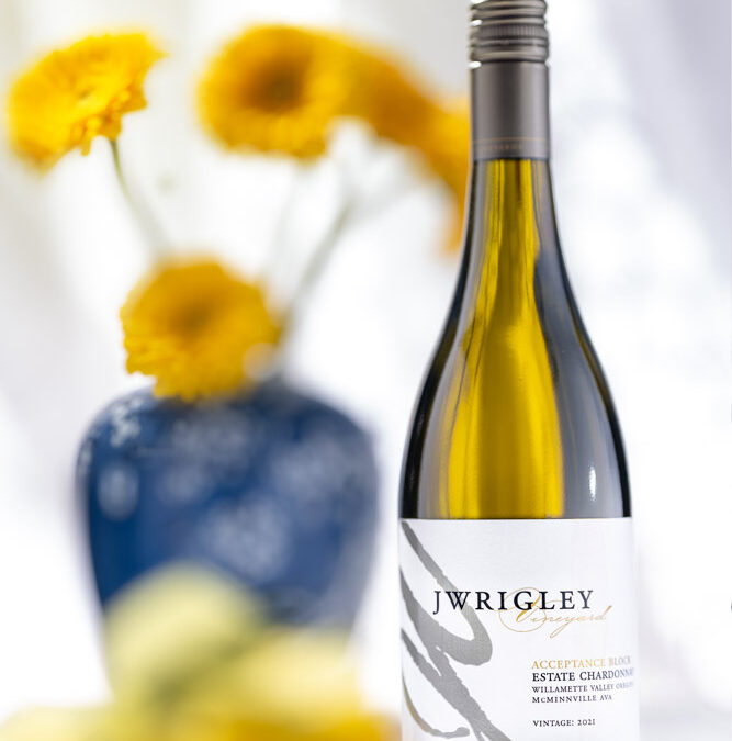 bottle of white wine against bright sunny background