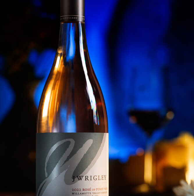 bottle of rose wine in night time setting